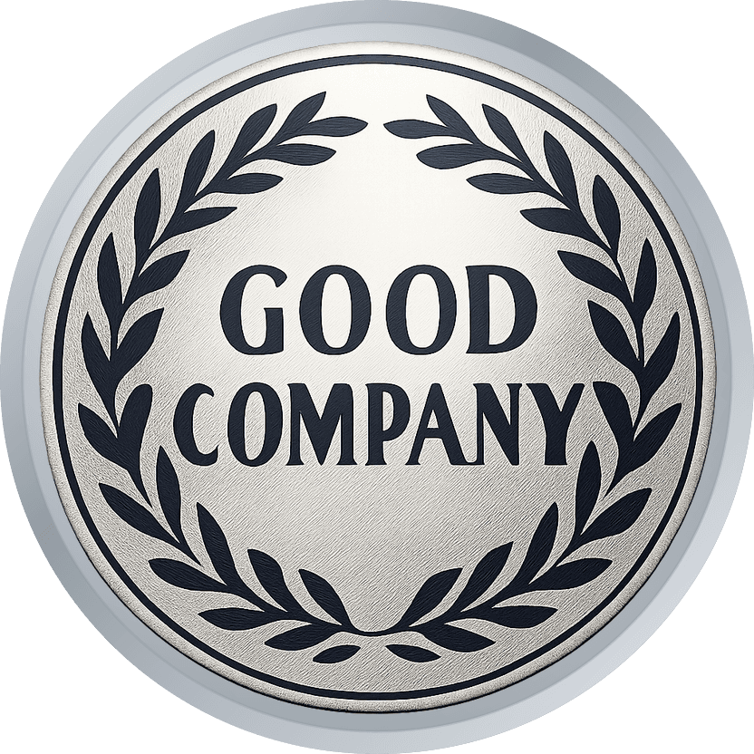 Silver memorial coin back with the dedication GOOD COMPANY inside a laurel wreath