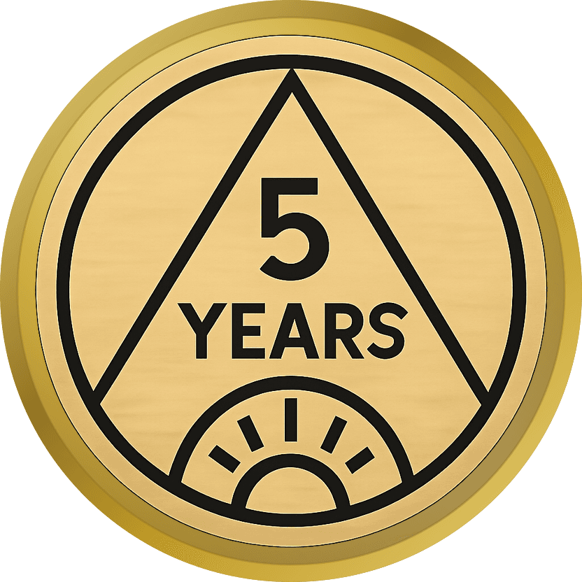 Gold sobriety coin with a triangle inside a circle and the words 5 YEARS, bare gold showing through the design